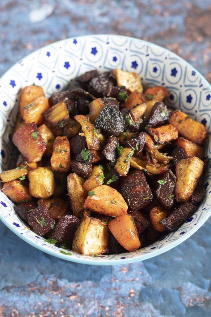 oven roasted vegetables in blue and white bowl