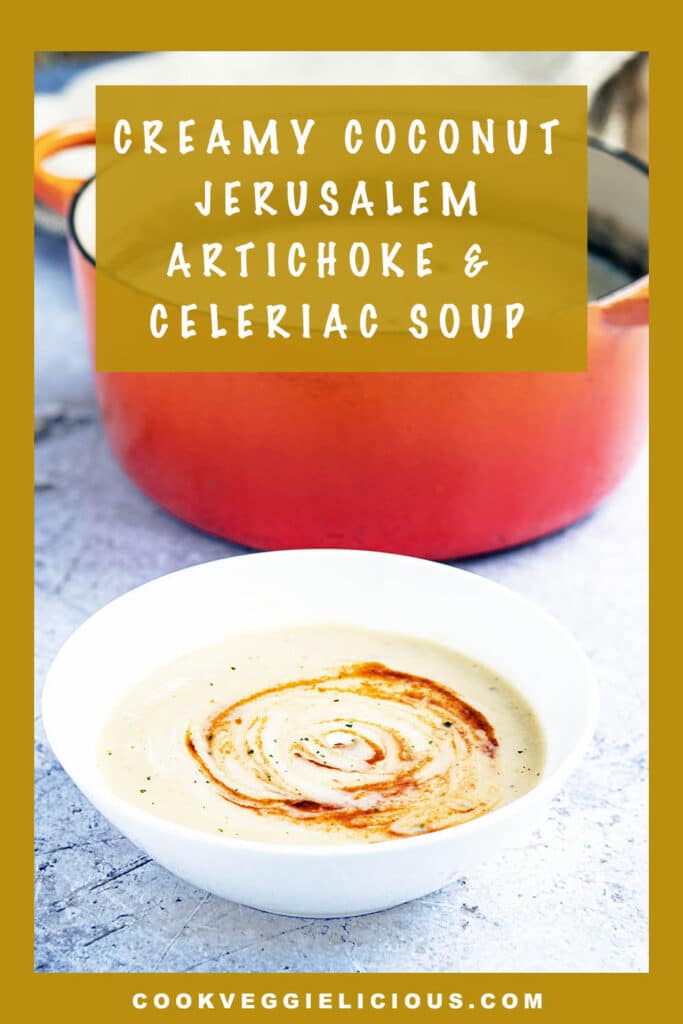 Jerusalem artichoke and celeriac soup in white bowl and cast iron pan