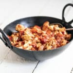 tandoori cauliflower curry in metal pan