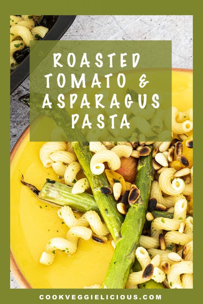 roasted tomato and asparagus pasta on yellow plate