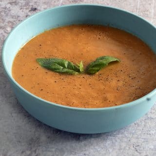 homemade vegan tomato soup with basil