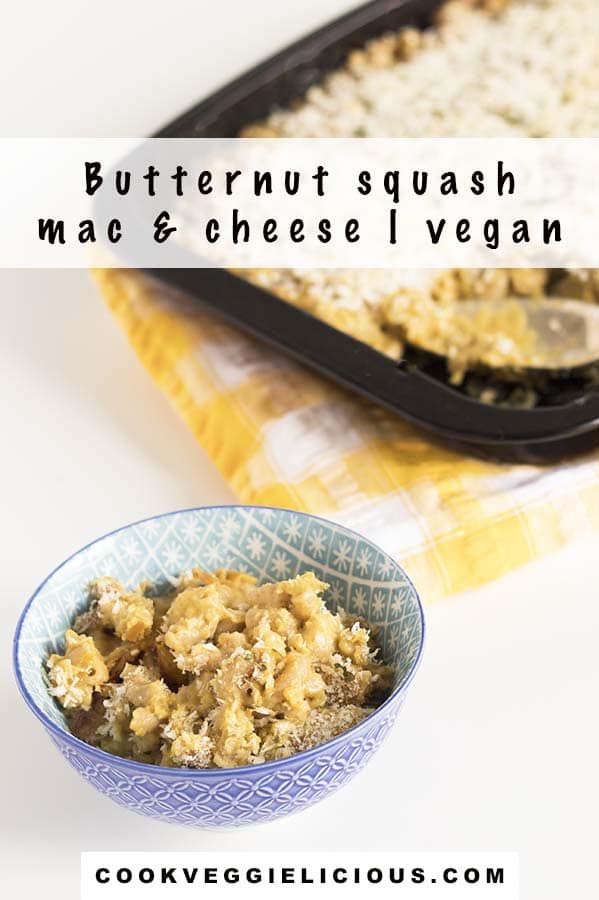 vegan butternut squash macaroni cheese in baking dish with a small portion in blue and white bowl