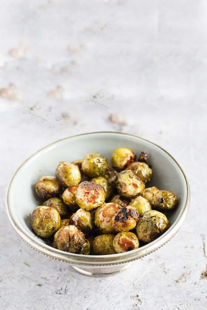 roasted brussels sprouts in grey bowl