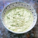 vegan tzatziki in blue and white bowl