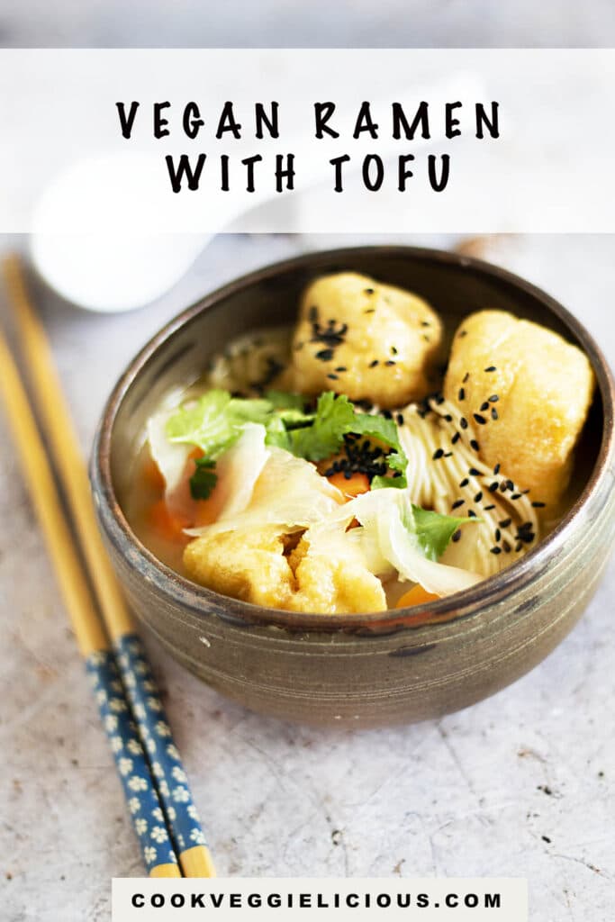 Vegan tofu ramen in bowl with broth spoon and chopsticks