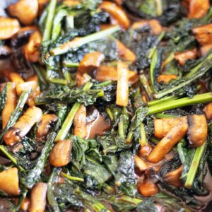 sauteed kale and mushrooms in pan