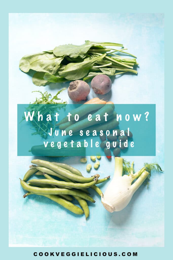 broad beans, rocket, beetroot, carrots, tomatoes, cucumber and fennel on blue background - vegetables in season in June