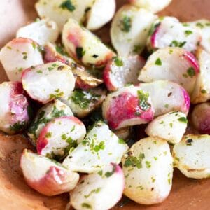 roasted radishes in terracotta plate