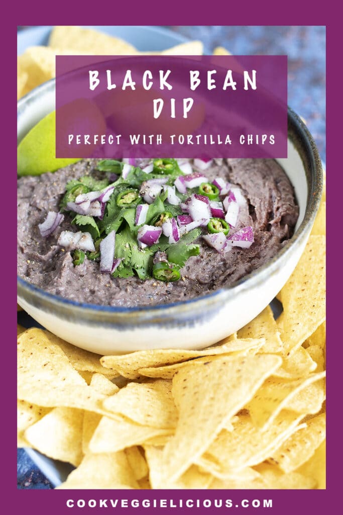 black bean dip in bowl with tortilla chips
