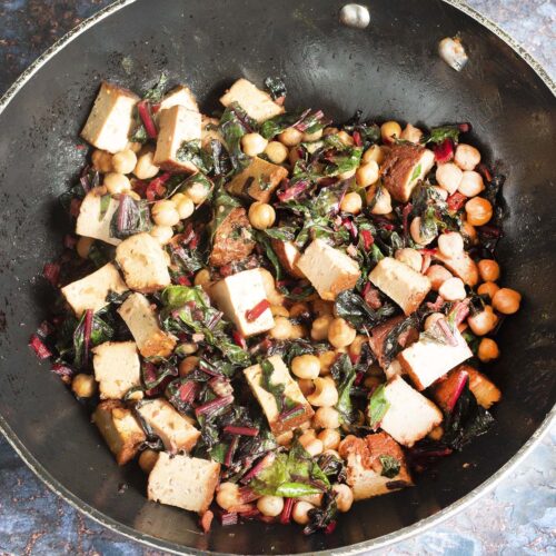chard with tofu and chickpeas in wok