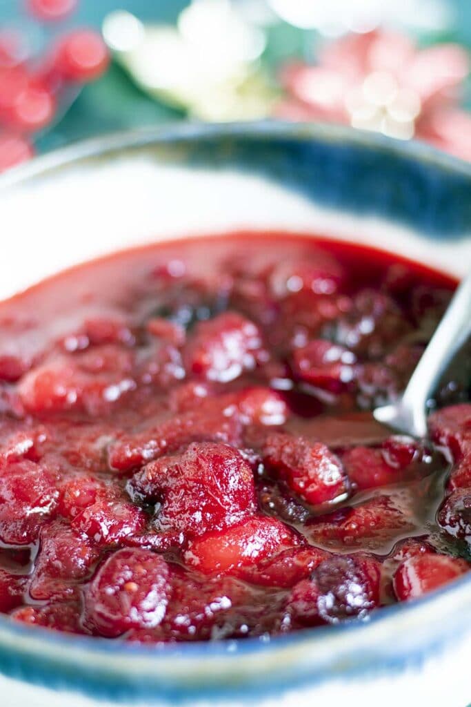 close up of cranberry sauce in blue and white bowl