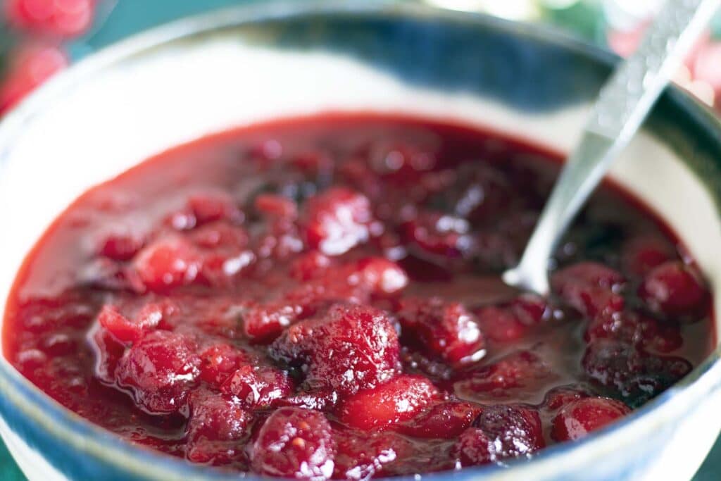 close up of cranberry sauce in blue and white bowl