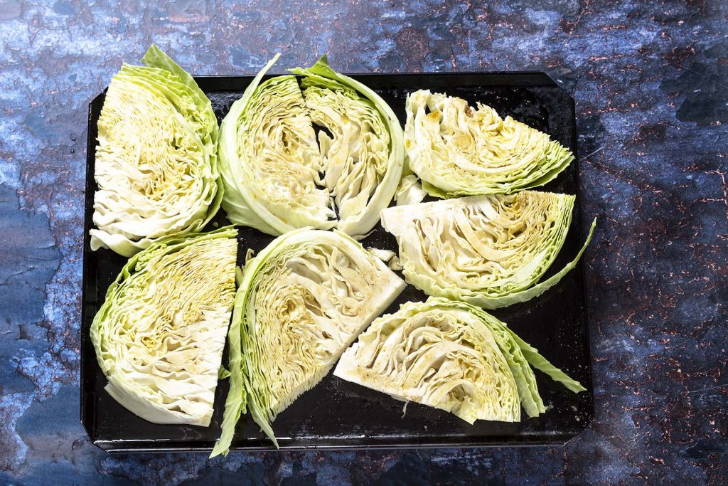 cabbage wedges on baking tray
