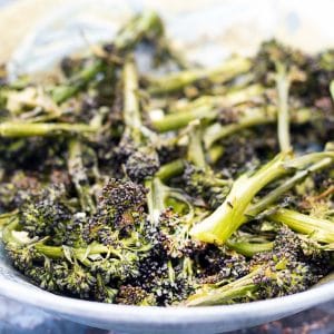 roasted purple sprouting broccoli in bowl