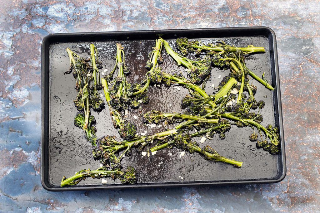 purple sprouting broccoli on baking tray