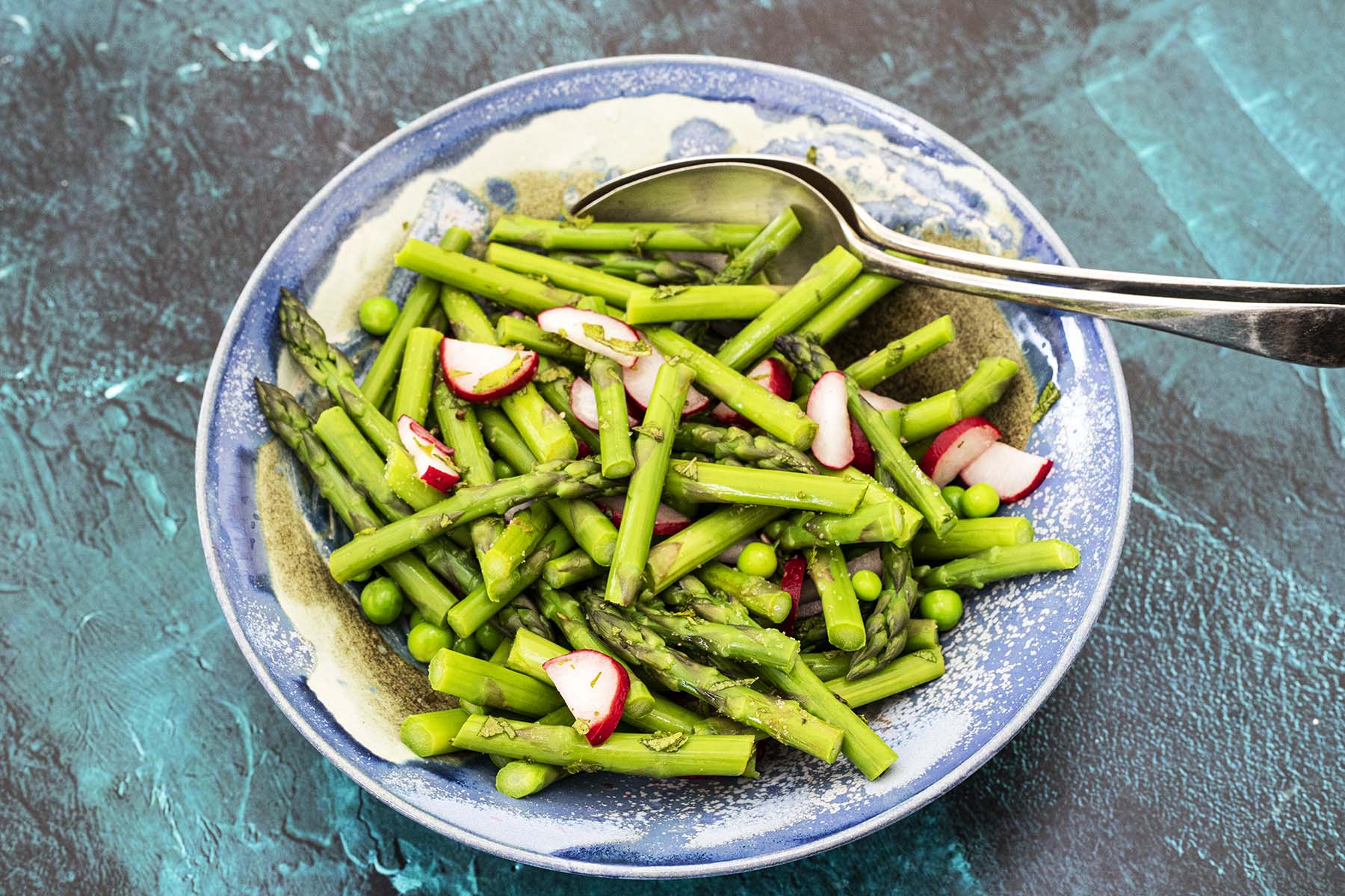 asparagus and pea salad in bowl