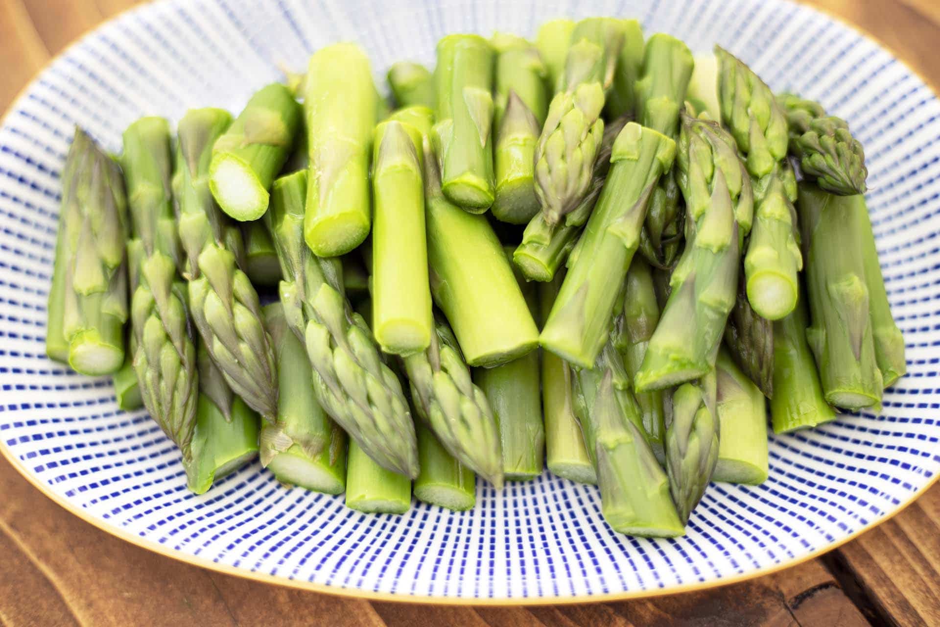 cooked asparagus on platter