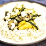 courgette stir fry with brown rice on plate