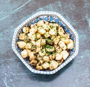 roasted kohlrabi in blue and white bowl